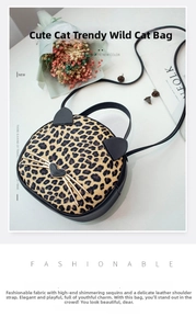 Detail shot of leopard print cat-shaped handbag with heart nose and metallic whiskers
