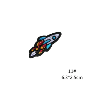 Detail of cartoon rocket embroidery patch with 6.3x2.5cm size and precise black stitching