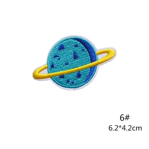 Detailed close-up of blue and yellow space planet embroidered patch with size 6.2x4.2cm