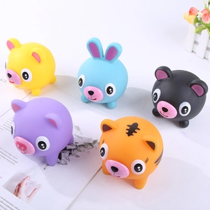 Set of five colorful squeeze animal stress relief balls for kids on a minimalist white surface