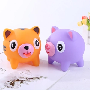 Stress relief squeeze toys featuring a cute orange tiger and purple pig on white background