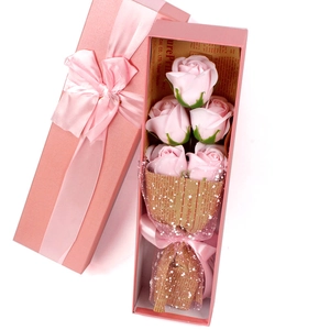 Detailed view of pink soap rose gift box with five roses and an elegant pink ribbon bow