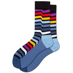 Detailed knit texture of colorful striped mid-calf cotton socks in rainbow colors