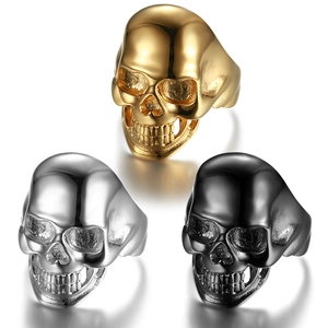 Polished skull rings for men and women in gold, silver, and black stainless steel finish