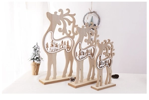 Three-piece set of wooden Christmas reindeer figurines in tiered sizes for home decor