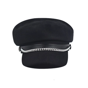 Stylish black wool newsboy cap with double silver chain and leather strap detail