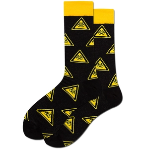 Detail of crew socks with biohazard symbol pattern in black and yellow color block style