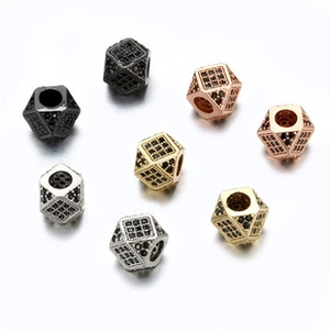 Detailed view of geometric micro-pave cubic zirconia beads for DIY jewelry making