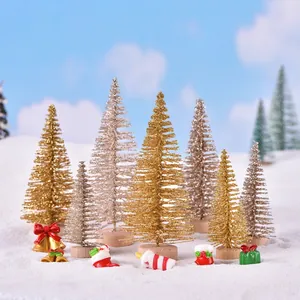 Miniature Christmas trees with gold and silver glitter on wood base for micro landscape