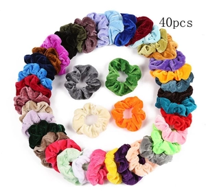 Flat lay of 40pcs velvet hair scrunchies in assorted colors arranged in a circle