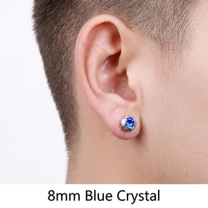 Model wearing 8mm royal blue magnetic stainless steel stud earring with silver metal edge