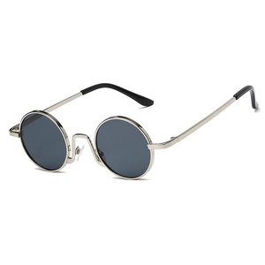 Retro round metal sunglasses with silver frame and dark polarized lenses in vintage style