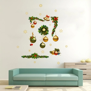 Christmas wall decal with golden bells and green wreath on a modern living room wall