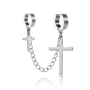 Silver stainless steel chain earrings with cross pendants on a white reflective base