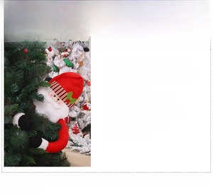 Detail showing Santa Claus tree topper made of brushed fabric for Christmas decoration