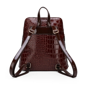 Deep red crocodile embossed patent leather mini backpack with elegant gold hardware