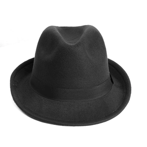 Close-up of black wool felt jazz hat featuring grosgrain ribbon and piped edge finish