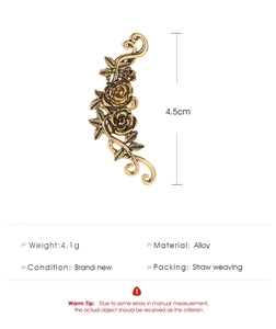 Detail view of vintage gold rose ear cuff with 4.5cm length and intricate carvings