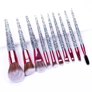 Detail of 10-piece makeup brush set with glitter handles and rose gold ferrules