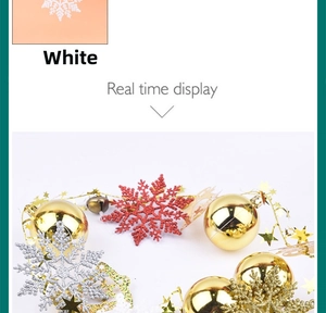 Detail of glitter snowflake ornaments and shiny golden baubles for Christmas tree decor