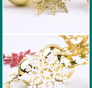 Detail of glittery gold snowflakes and glossy ornaments for Christmas tree decor