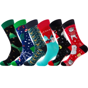 Set of 6 pairs of colorful Christmas cotton socks with Santa and reindeer patterns