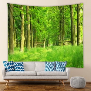 Close-up of bohemian forest tapestry showing high-quality vibrant green leaf printing details