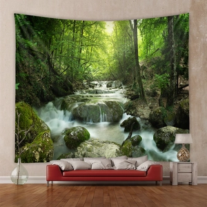 Detailed view of forest landscape tapestry hanging over a sofa in a modern living room