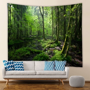Detail of bohemian forest tapestry showing lush green woods for living room wall decor