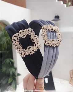 Detail showing high-quality velvet headbands with sparkling square crystal buckles