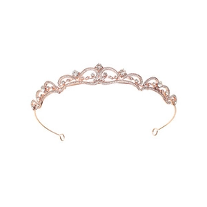 Detailed view of rose gold bridal crown with crystal embellishments and wave design