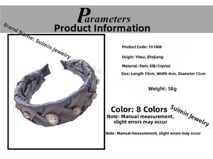 Detailed view of grey pleated satin headband with elegant rhinestones and braided texture