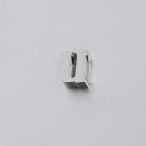 Close-up of a 10mm mirror polished stainless steel alphabet letter U spacer bead