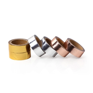 Metallic washi tape rolls in gold, silver, and rose gold finishes for DIY crafts