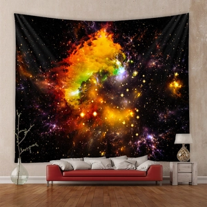 Detailed starry space nebula tapestry hanging above a sofa for home wall decor