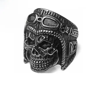Detail shot of vintage punk skull pilot ring with retro mechanical goggles design