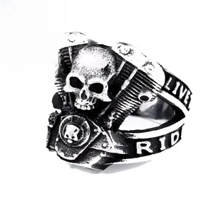 Detail view of motorcycle engine skull ring featuring Live Ride side engraving
