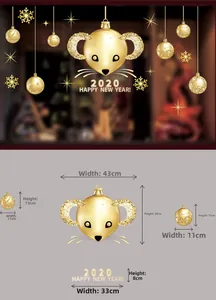Detail of golden Christmas window stickers with festive rat motif and size specifications