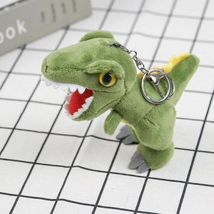 Detail of green plush dinosaur keychain with soft texture and sturdy metal ring