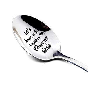 Stainless steel coffee spoon engraved with Let's Have Coffee Together Forever text