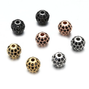Macro view of micro-paved black zircon beads in four metal finishes for DIY jewelry