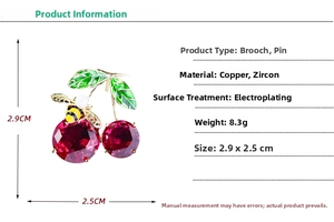 Detail view showing dimensions of red enamel cherry brooch with bee and green leaves