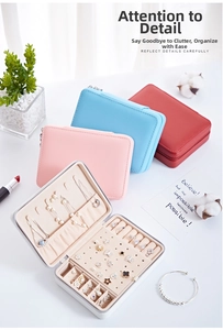 Compact portable jewelry organizer with ring slots and earring display in four colors