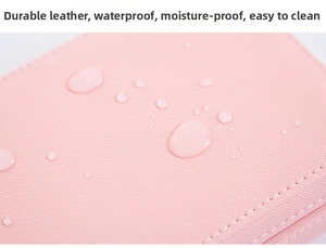 Close-up of waterproof pink cross-grain leather jewelry box showing water resistance