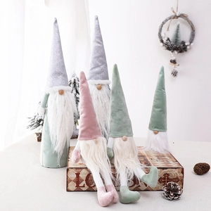 Five assorted Nordic Christmas gnome plush dolls in pink and grey with pointed hats