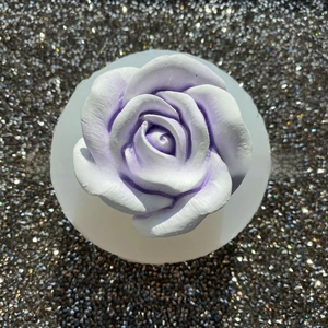 Macro view of a detailed purple 3D rose flower made from a DIY silicone craft mold