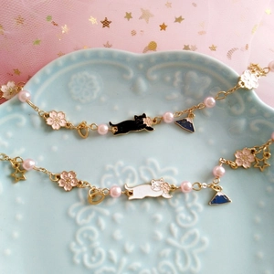 Japanese style cat and cherry blossom charm bracelet with pearls and Mount Fuji pendant