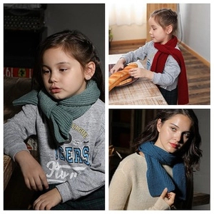 Detailed close-up of knitted winter scarves in green, red, and blue soft fabric styles