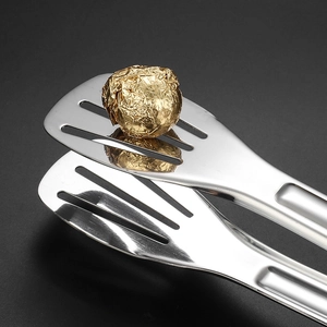 Pince alimentaire en acier inoxydable poli pour buffet avec tête creuse design