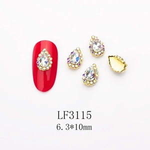 Detailed view of LF3115 aurora teardrop nail jewel with gold alloy base and k9 crystal